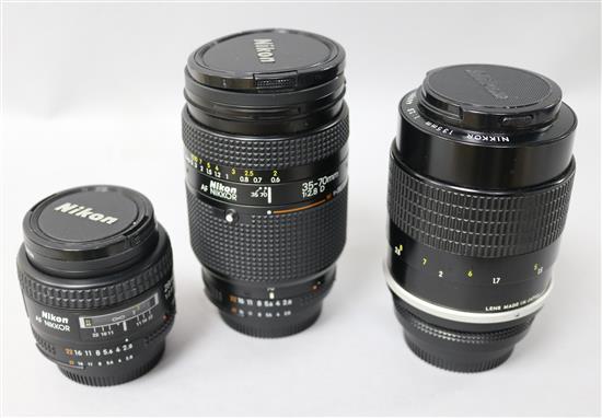 A Nikon 135mm 200m lens, a 35-70mm 200m lens and 52mm lens
